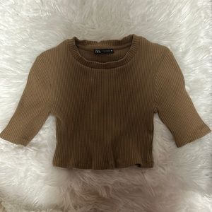 this is a zara top in a brown color in a size M